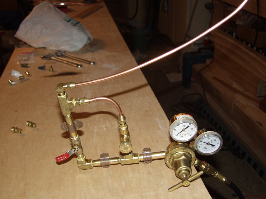 Here is the regulator and idle loop with the flared fittings I decided to use as a safety factor and better fitting in general. This requires that you have a flaring tool to flare the copper pipe, but I think that's a small price to pay for the comfort...my $0.02...