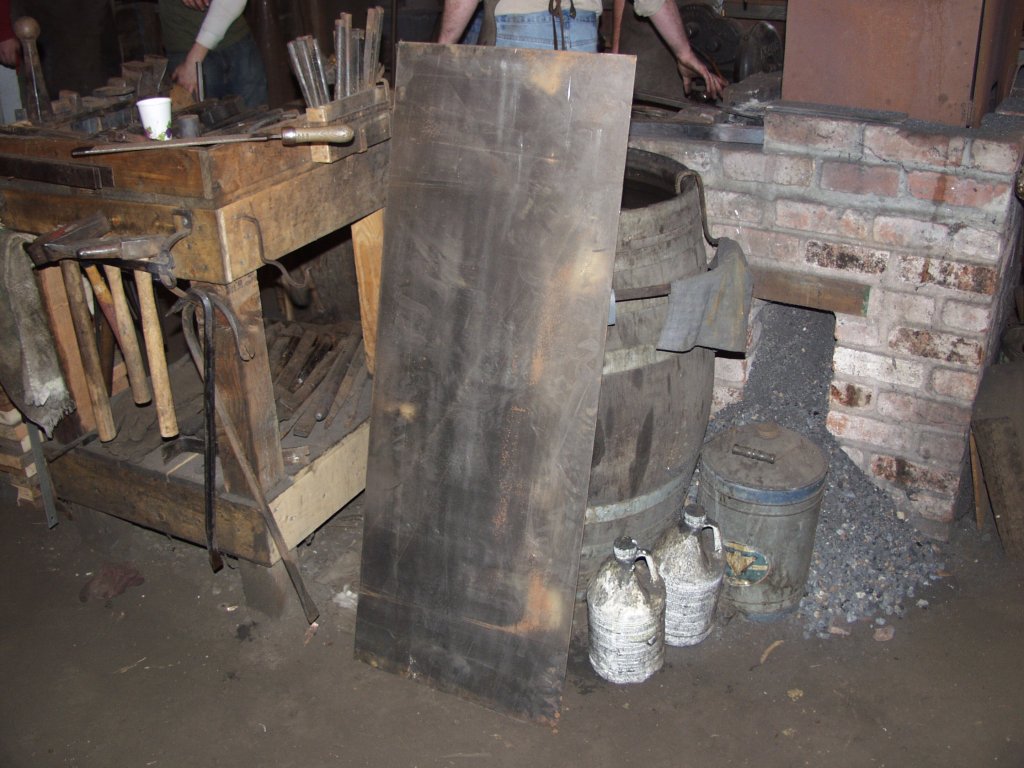 Forge building, sheet of steel as I got at the smithy, it seems 15 gauge per a sheet gauge.